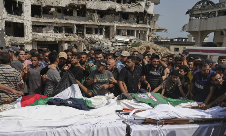 Israel targets emergency workers trying to help people trapped in ...