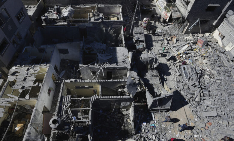 Scores killed trying to get food from an aid convoy during a ...