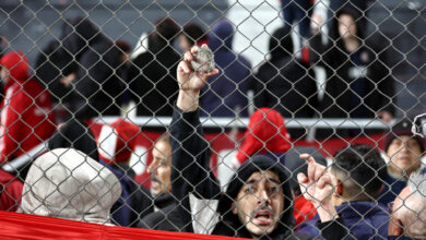 Ten hurt, 90 arrested as match abandoned following fan violence in ...