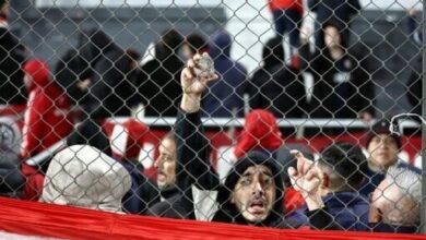 Ten hurt, 90 arrested as match abandoned following fan violence in ...