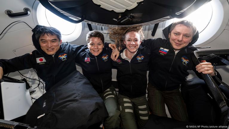 NASA astronauts return to Earth from ISS after five months – DW ...