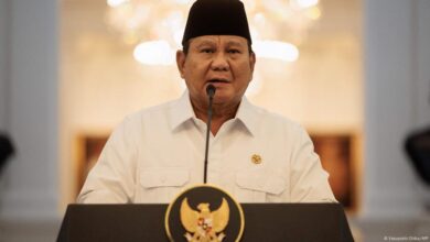 Indonesia's president yields to protests, tightens security