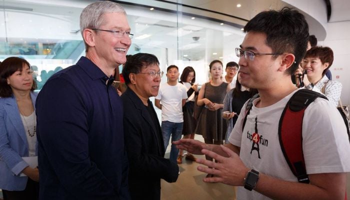 Apple's CEO Tim Cook vows to boost Chinese investment amid trade ...