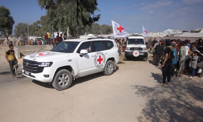 Hamas returns 4 hostages' bodies after Israel threatens aid cut