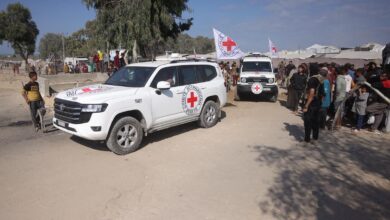 Hamas returns 4 hostages' bodies after Israel threatens aid cut