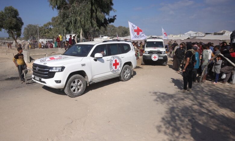 Hamas returns 4 hostages' bodies after Israel threatens aid cut