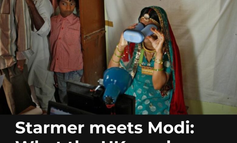 Modi and Starmer meet in India to promote trade deal | AP News